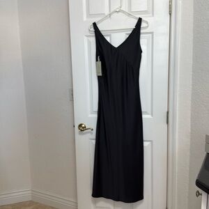 New with tags! Long black satin dress.
